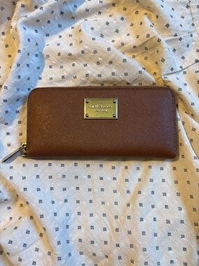 Micheal Kors saffiano leather zip around continental wallet